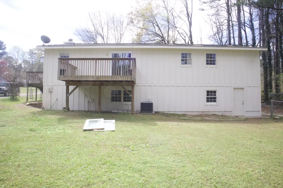 After: Back of a two-level Acworth home with a raised deck