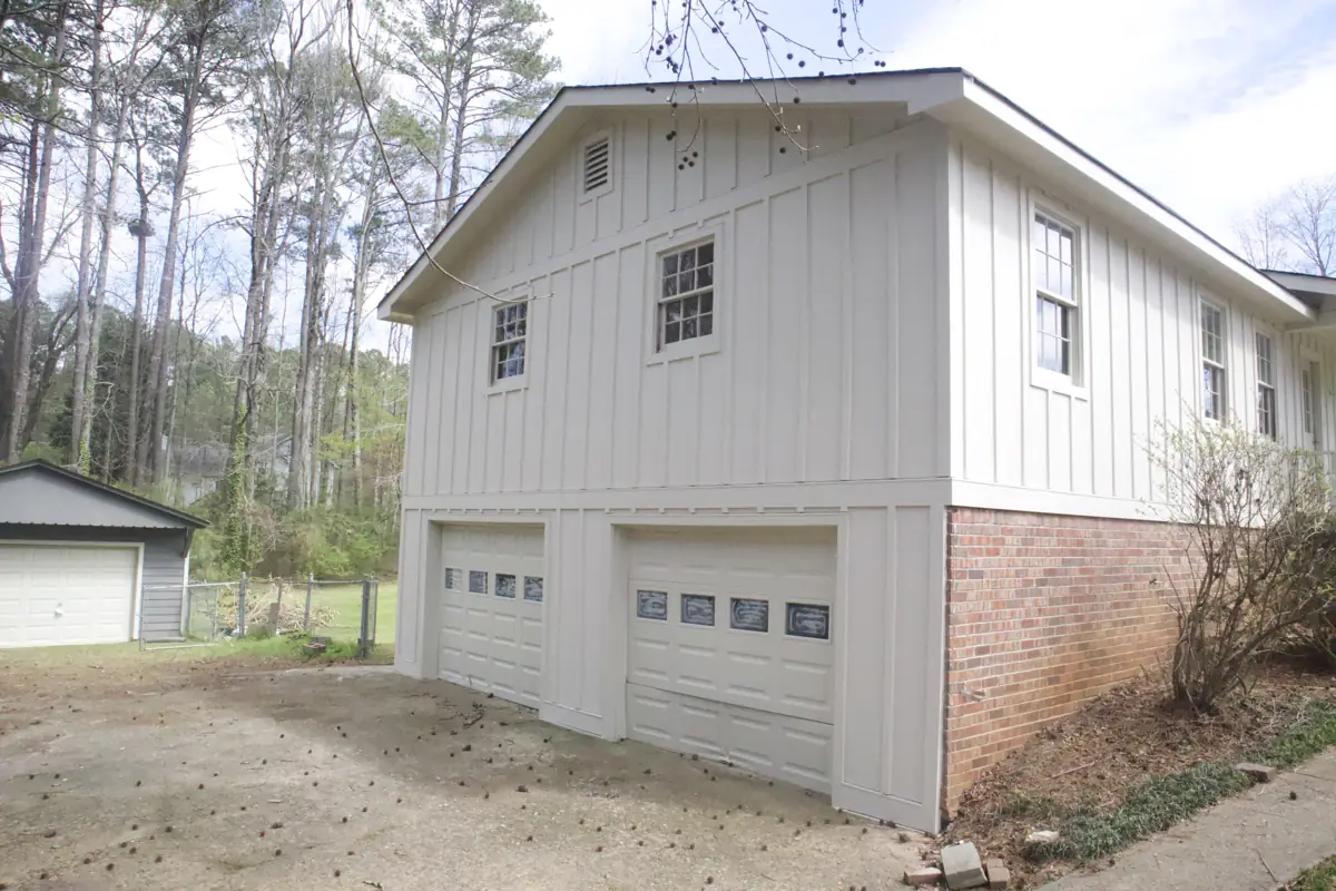 After: Garage side of a two-level Acworth home