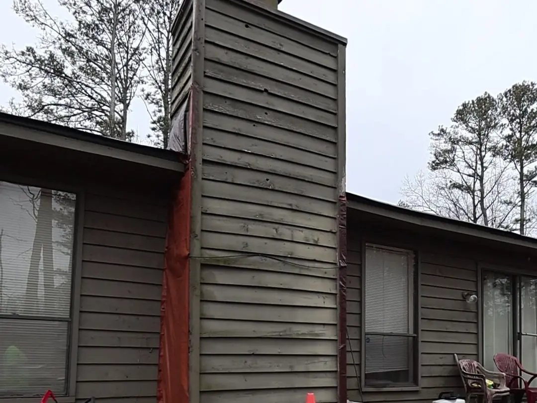 Before: Back of an Acworth ranch home with the chimney chase