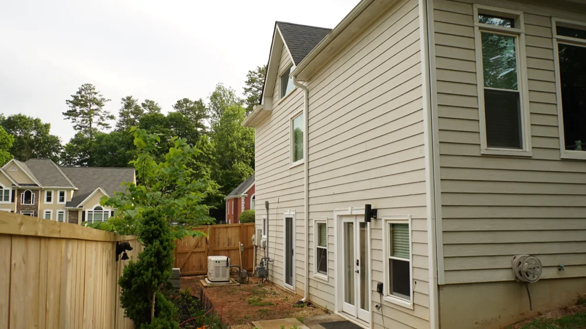 Before: the right side of the house.