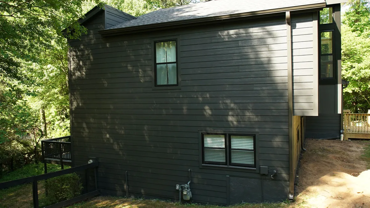 After: the same side wall re-sided.