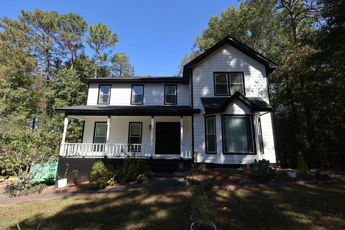 Siding Replacement with Black Trim in Woodstock, GA